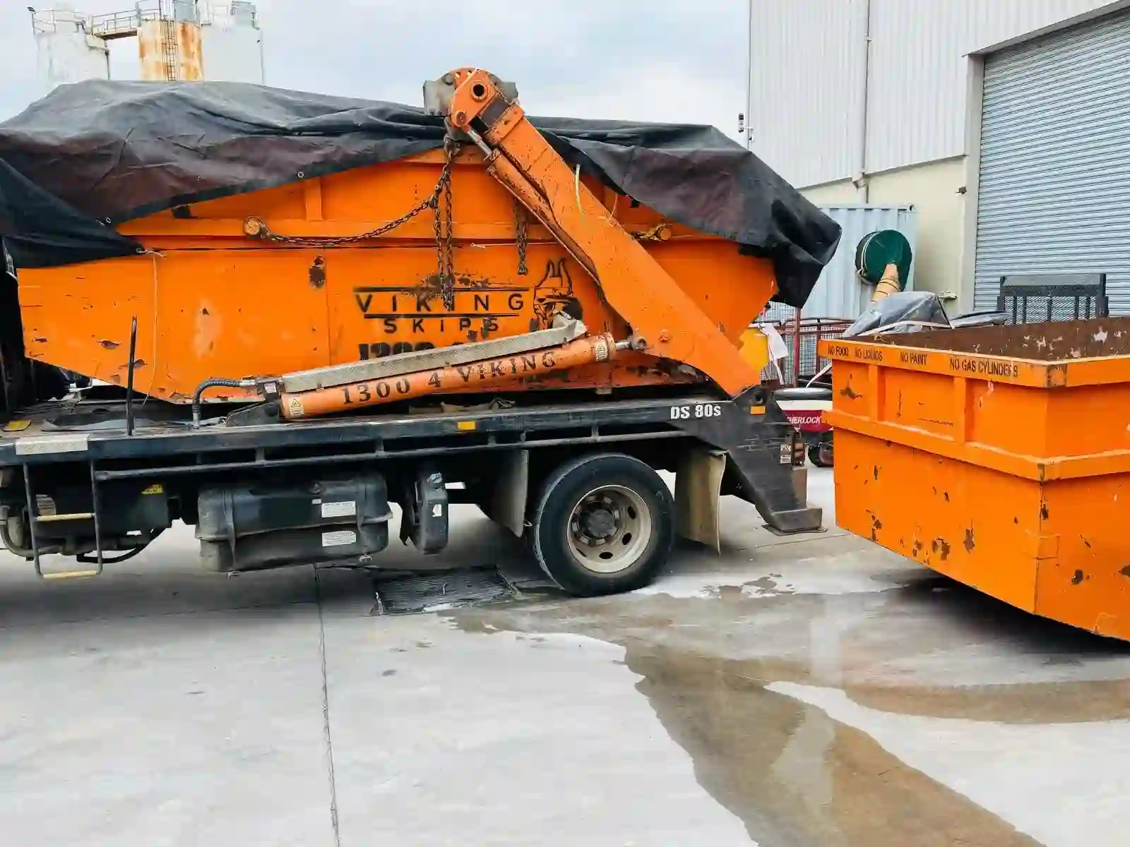 Viking Skips delivery truck on a suburban street
